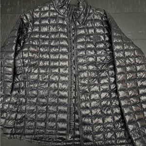 The North Face Black Puffer Jacket with Quilted Design